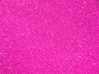 Pink blurred background with sparkles for text.