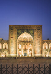 Registan Square, Ulugbek Madrasah, Sherdor Mosque Madrasah and Tillya-Kari Madrasah in the ancient city of Samarkand in Uzbekistan, oriental architecture in the evening with backlighting