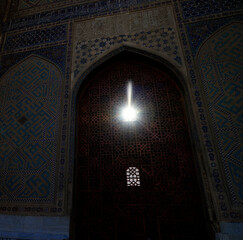 The sun through the gate of the Bibi Khanym Mosque, Samarkand, Uzbekistan
