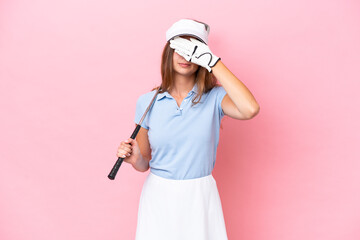 Young golfer player man isolated on pink background covering eyes by hands. Do not want to see...