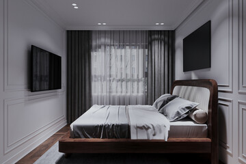 view of a dark bedroom with a bed, TV, and white decoration in the bedroom