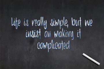 Life is really simple, but we insist on making it complicated - Confucius quote on a blackboard