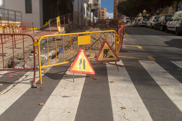 Construction Signs and Barricades on City Street During Daytime