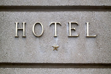 One star hotel sign