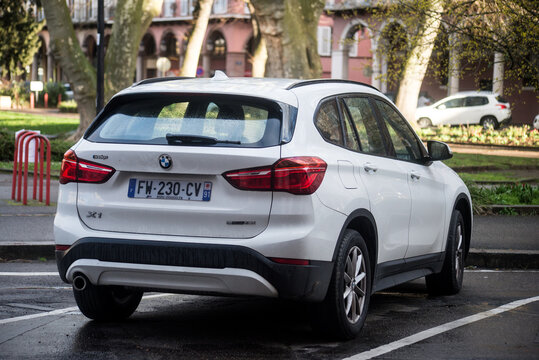 Mulhouse - France - 25 february 2024 - rear view of white BMW X1 parked in the street