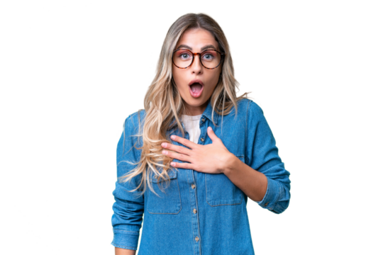 Young Uruguayan woman over isolated background surprised and shocked while looking right