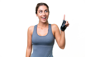 pretty Sport Uruguayan woman over isolated background thinking an idea pointing the finger up