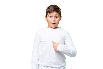 Little caucasian kid over isolated chroma key background pointing to oneself