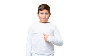 Little caucasian kid over isolated chroma key background pointing to oneself