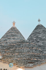 Fototapeta na wymiar Alberobello, White Roofs of Puglia: Trulli of Alberobello in Puglia, Italy - Trullo
