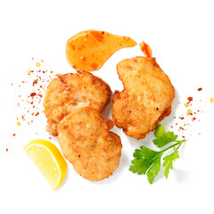 Chicken breast fried in batter or nuggets with chili sauce. top view.  isolated on white background