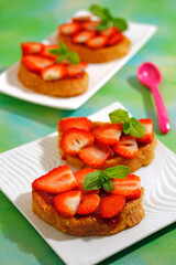 Torrijas (typical Spanish meal) with strawberries.