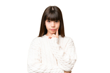 Fototapeta premium Little caucasian girl over isolated background and thinking