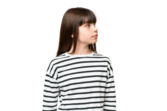 Little caucasian girl over isolated background looking to the side