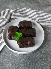 Block cake is a typical West Java snack which is rectangular in shape and thick. The ingredients  include wheat flour, milk, sugar, baking soda, eggs, and margarine. Kue Balok Brownies