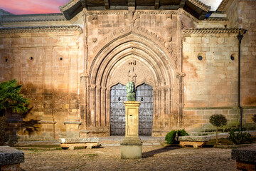 Side facade with Gothic entrance of the Santísima Trinidad church of Alcaraz, Albacete, Castilla...