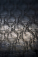 detail of transparent bubble wrap in dark tone vertically