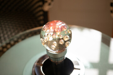Multi-colored magic ball on the table
