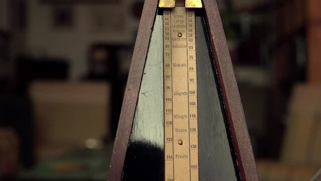Mechanical vintage metronome measuring music Rhythm, time