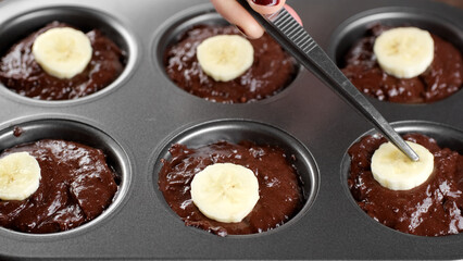 Cooking chocolate cakes with banana