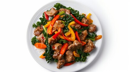 Thai food Stir-fried Crispy Pork spicy and Chinese kale served without rice decorate with green peppers yellow chili and carrots carved white plate top view isolated on white background