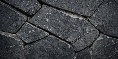 Obraz premium Black white stone texture. Rock surface. Close-up. Like a old rough concrete wall. Dark gray grunge background with space for design