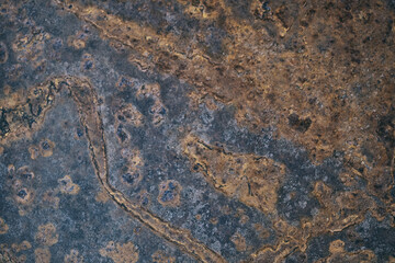 Rusty metal barrel texture detail. Scratched paint and rust. Abstract background. Old rusted metallic door. Close up view of corroded and rusted metal. Rusted metal background in vintage style