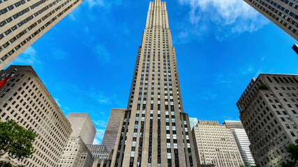 Fototapeta na wymiar The Rockefeller Center building, which is one of the largest and most famous skyscrapers in Manhattan, is part of the typical scenery of New York (USA).