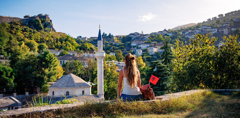 Back view of female traveling in Albania-Gjirokaster