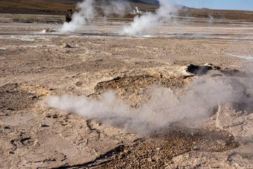 Tatio Geysers in San Pedro de Atacama, Chile, South America. Dramatic volcanic hot springs with rising water and steam