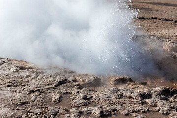 Tatio Geysers in San Pedro de Atacama, Chile, South America. Dramatic volcanic hot springs with rising water and steam