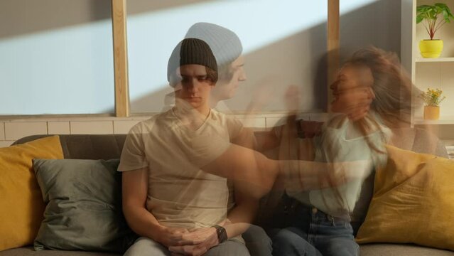Portrait of man and girl in the room on the couch. Woman starts scream in tension yelling expressively, man is calm, both quarrel at same time. Double exposure.