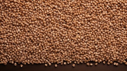 Fototapeta premium Buckwheat on a wooden background. The concept of healthy eating. Buckwheat contains a large amount of vitamins and minerals.