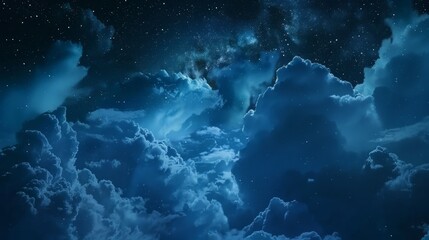 Fototapeta na wymiar Clouds float across the dark blue evening sky