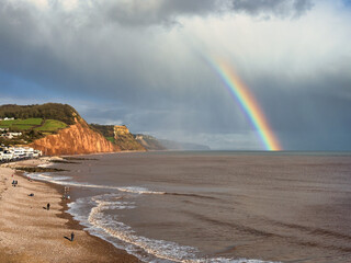A rainbow over Sidmouth beach in Devon, UK.