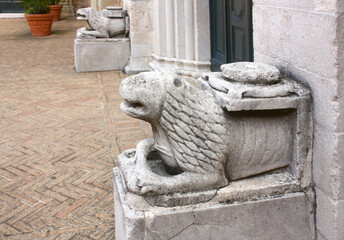 Marble lions near Cathedral of Santa Maria Assunta in Pesaro, Italy
