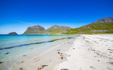 Summer vibes at the sandy Vik Beach at Lofoten Islands in Norway