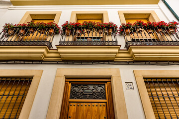 Colorful narrow street travel view, Cordoba, Andalusia, Southern Spain, Europe, EU. Wonderful place to wander in the city