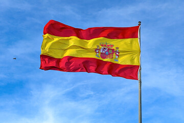 Spanish flag in blue sky
