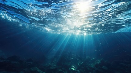 Sunlight piercing through clear water, ideal for nature themes