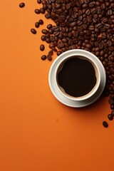A cup of coffee surrounded by coffee beans. Suitable for coffee shops and cafes