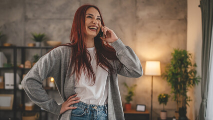 one young woman at home use mobile phone smartphone have a call talk