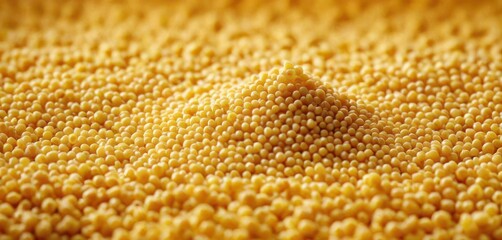 a close up of a yellow surface with a lot of small holes in the middle of the surface and a small amount of small holes in the middle of the surface.