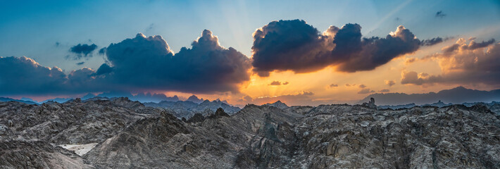 Scenic wide Sunset panorama over Red Sea Hills mountain chain. Very sharp mountain peaks. Hurghada,...