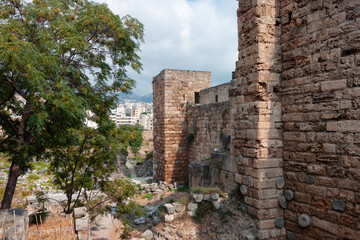 View of the stone walls of the old ancient crusader castle in the historic city of Byblos. The city...