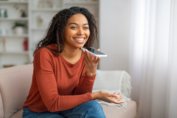 Modern Technologies. Portrait Of Happy Black Woman Recording Voice Message On Smartphone