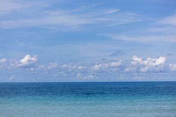 Stunning beautiful sea landscape beach with turquoise water. Beautiful Sand beach with turquoise water. Beautiful tropical beach with blue sky and white clouds.