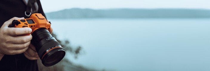 Photographer holding a camera