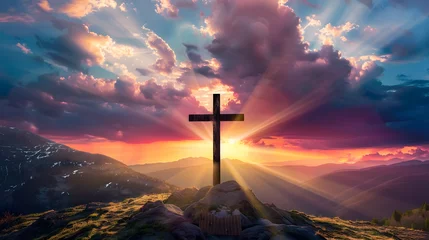 Fotobehang jesus christ cross easter resurrection concept christian cross on a background with dramatic lighting colorful mountain sunset dark clouds and sky and sunbeams © Prasanth