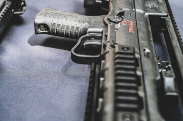 Close-up of the assault rifle. Modern military weapons. Trigger and handle.